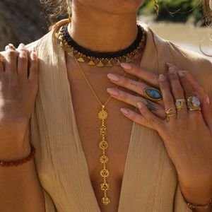 Elegant gold seven chakra necklace by Daya Jewelry